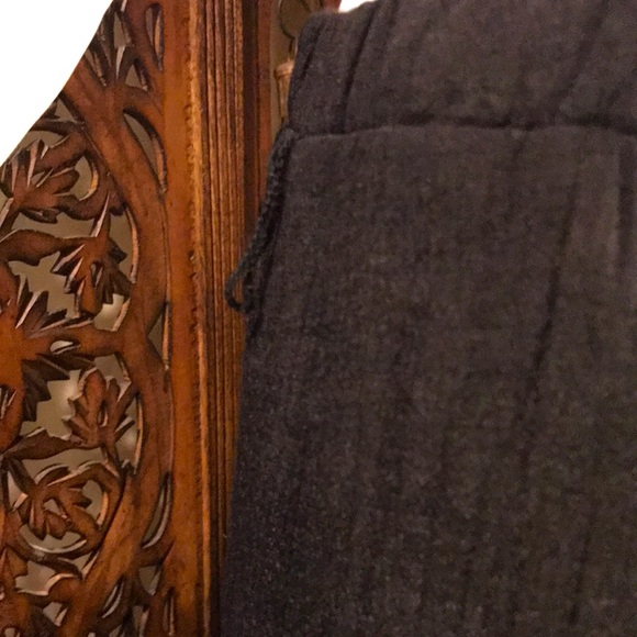 Black Skirt with High-Low Hemline and front slit with cascading ruffles. - Picture 5 of 14